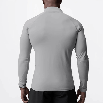 Men's Muscle V-Taper Quarter Zip performance top in gray, showcasing a flexible fit and sculpted back design for athletic wear.